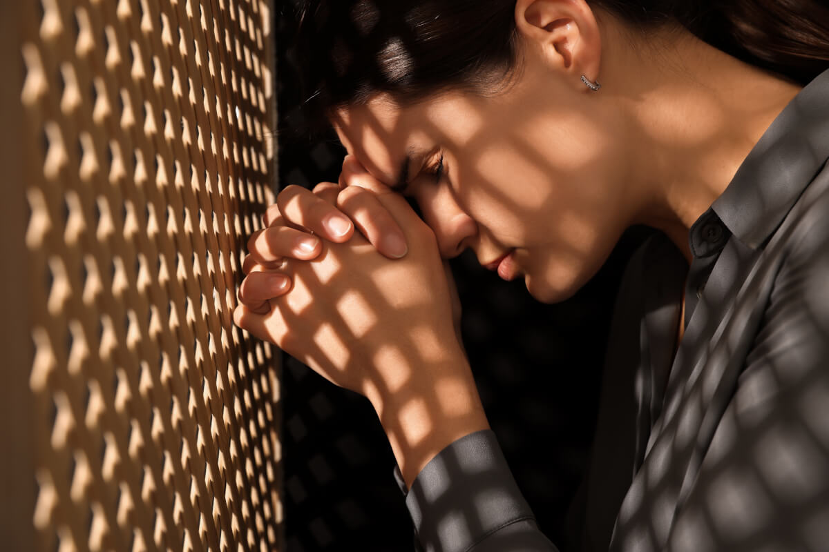 Repentant Woman in Confession