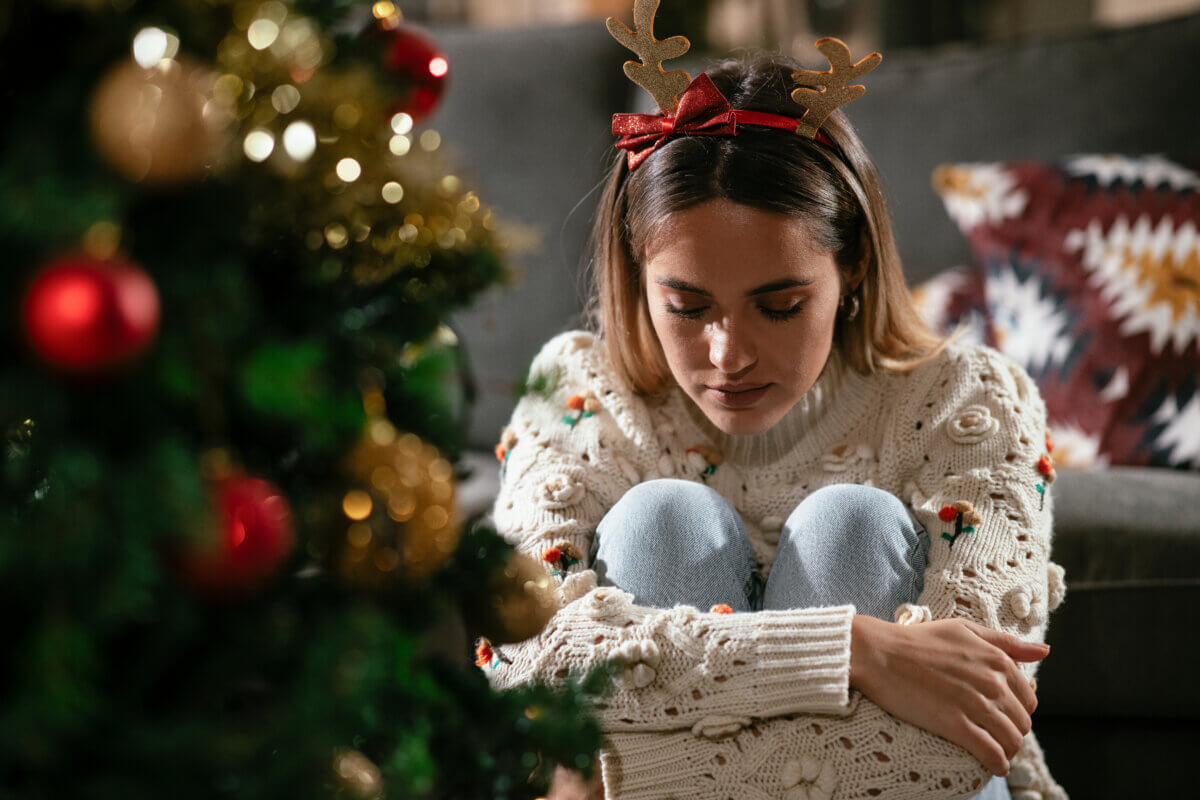 woman grieving at Christmas