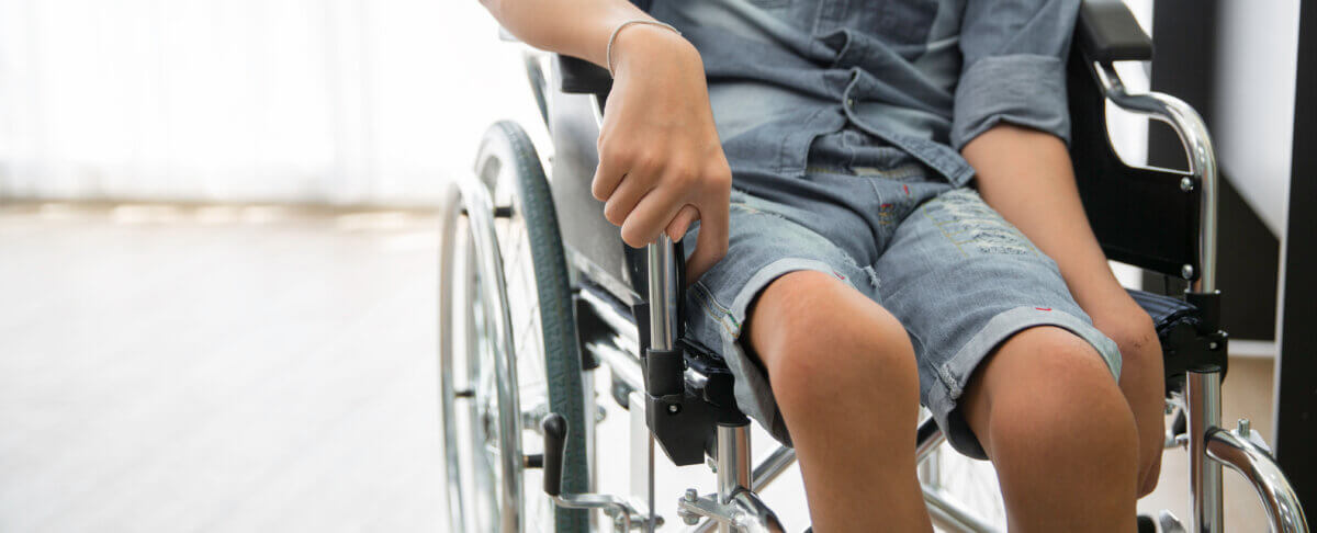 Polio Patient in Wheelchair