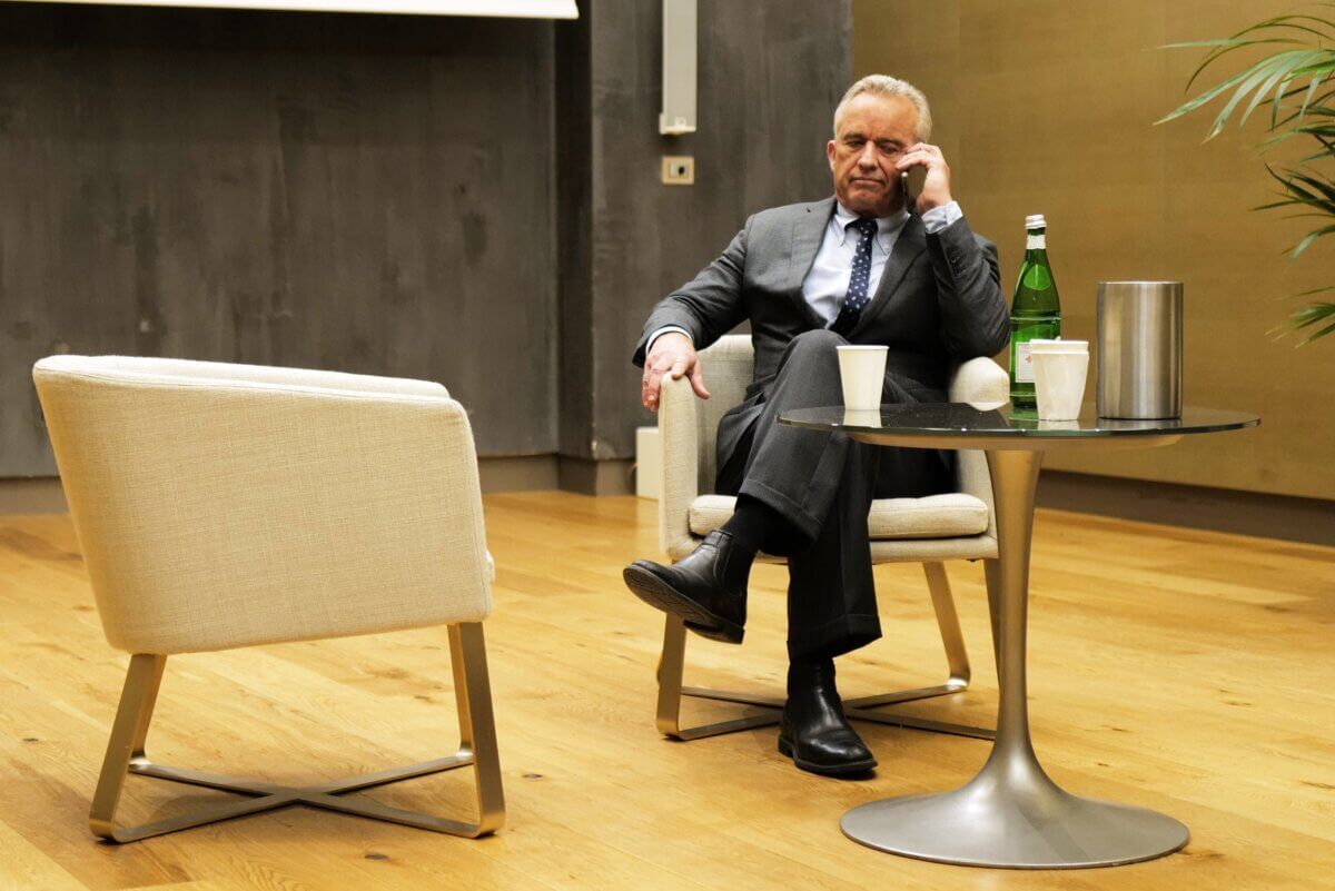 Robert F. Kennedy, Jr. takes a phone call during an interview in Italy in 2021