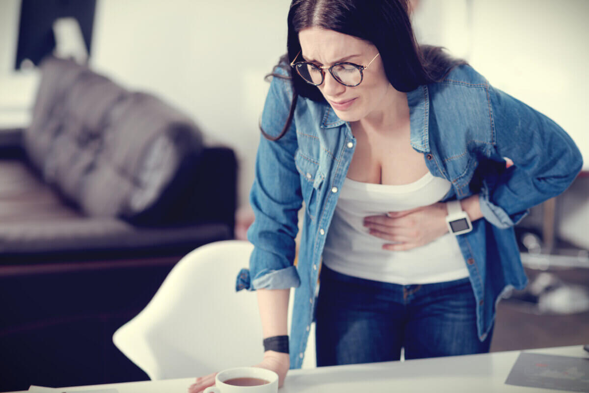 Woman with stomach pain