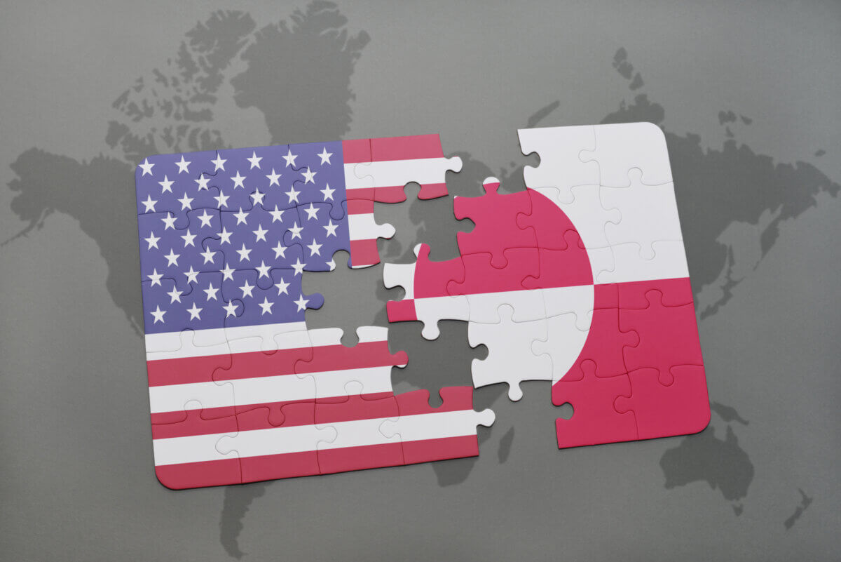 Puzzle pieces connecting the U.S. flag and Greenland's flag