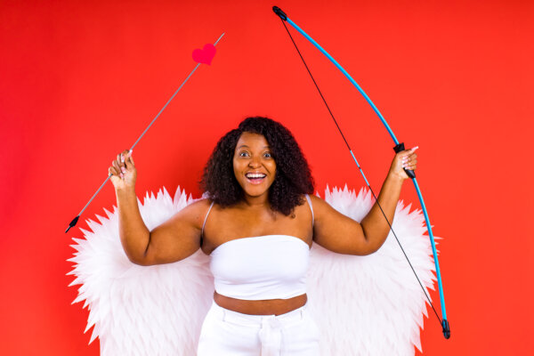 A woman dressed like cupid