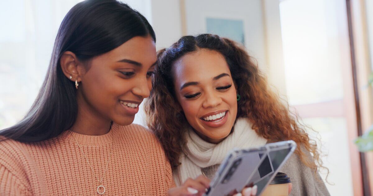 Friends looking at a dating app