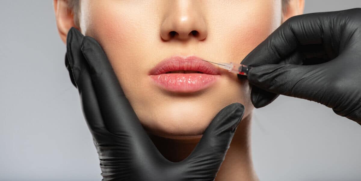 A woman getting lip filler