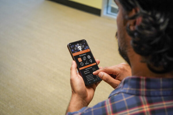 Man using an online sportsbook betting app