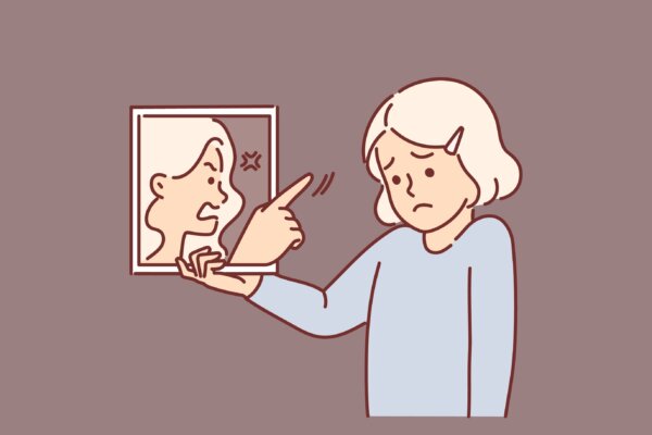 Sketch depicting woman feeling shame, low self-esteem