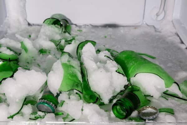 Broken glass bottles in the freezer