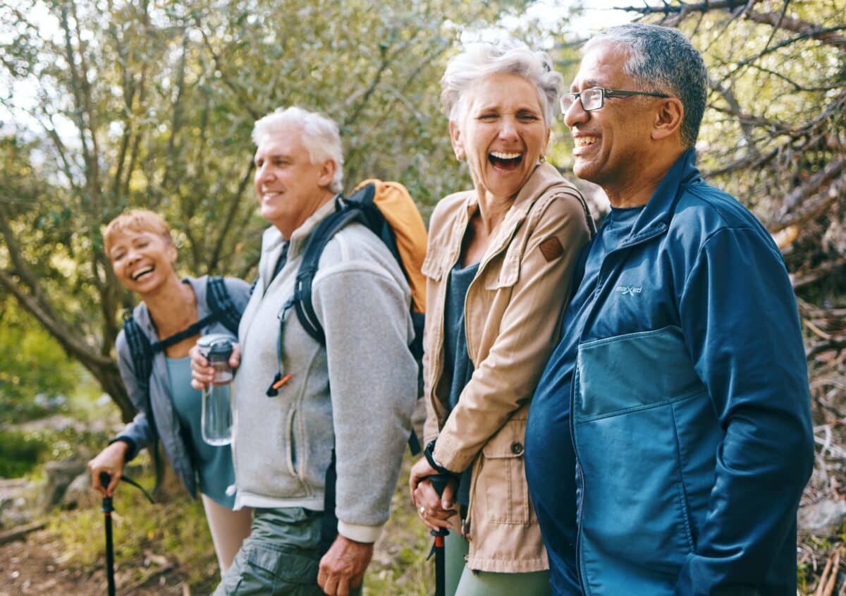 A group of older people hiking