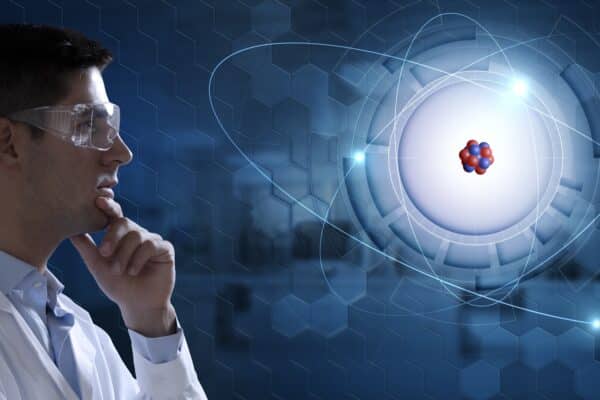 Scientist looking at an atom