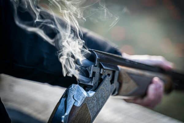 Recently fired shotgun that is smoking