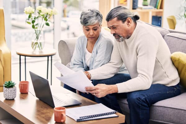 Older couple looking at bills or paperwork