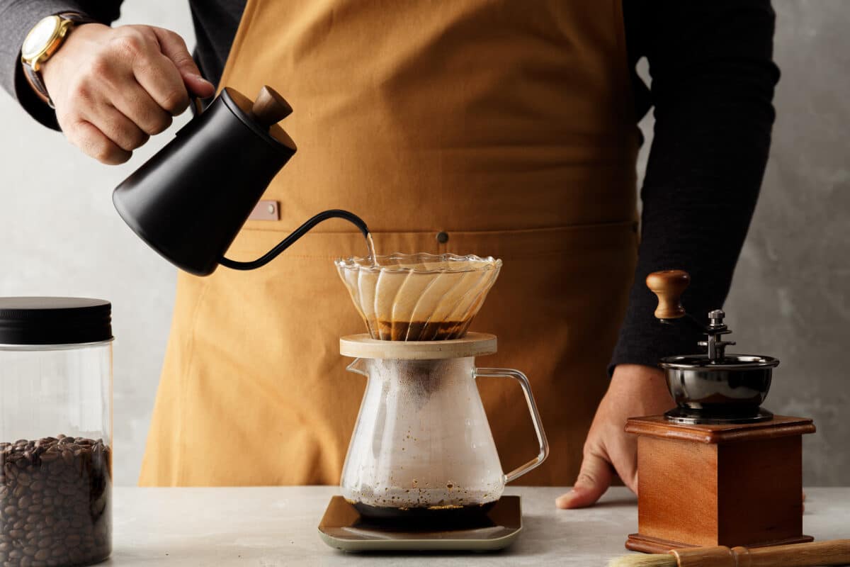Barista making a cup of pour-over coffee