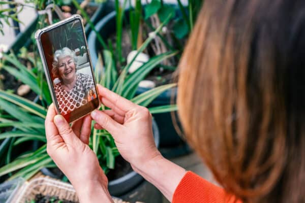 Woman on FaceTime call with her mother or grandmother