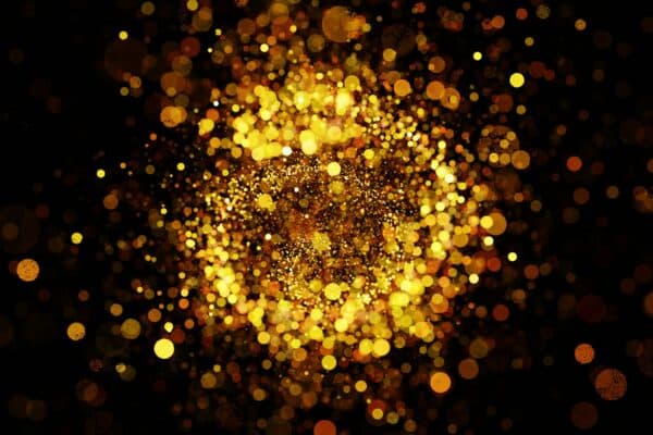 Gold specks swirling around