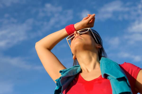 A woman sweating in hot weather