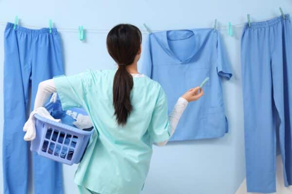 A doctor doing laundry