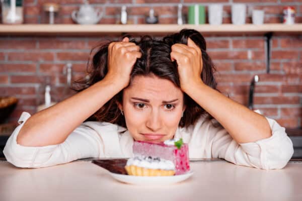 A woman trying to resist cravings