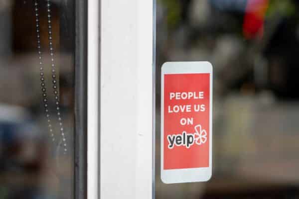 Yelp sticker on restaurant window