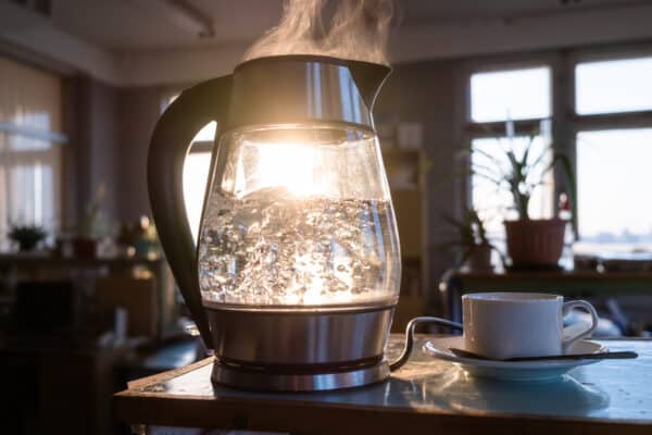 Boiling water in tea kettle