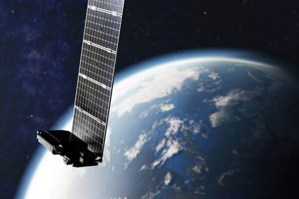Conceptual image of a Starlink satellite orbiting Earth.