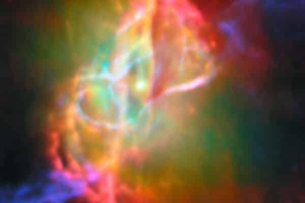 This image, which combines infrared data from the James Webb Space Telescope with submillimeter observations from the Atacama Large Millimeter/submillimeter Array (ALMA), shows the doughnut-shaped torus and interconnected bubbles of dusty gas that surround the Butterfly Nebula’s central star.