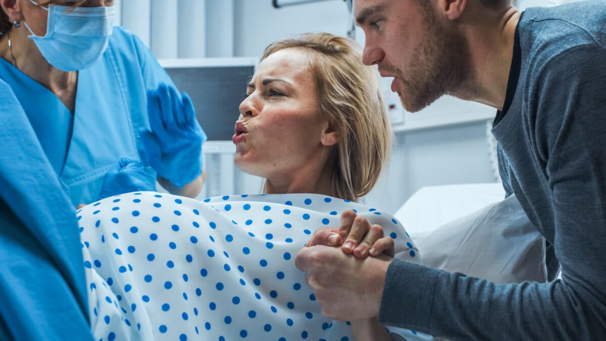 Pregnant woman giving birth
