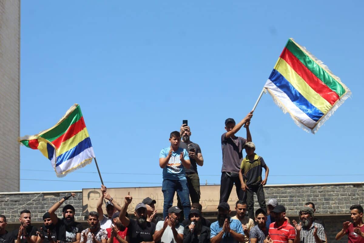 In touching scenes, the flag of the revolution and the flag of the Druze were raised in Al-Karama Square in the center of the city of As-Suwayda, Syria