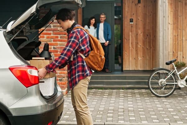Parents look on as their child heads off to college