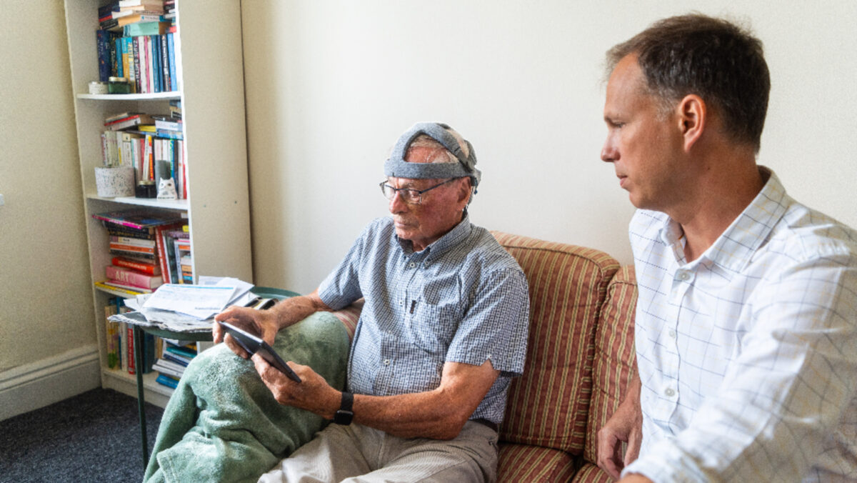 John Stennard, a healthy volunteer, taking the Fastball test in his home, with Dr. George Stohart, University of Bath