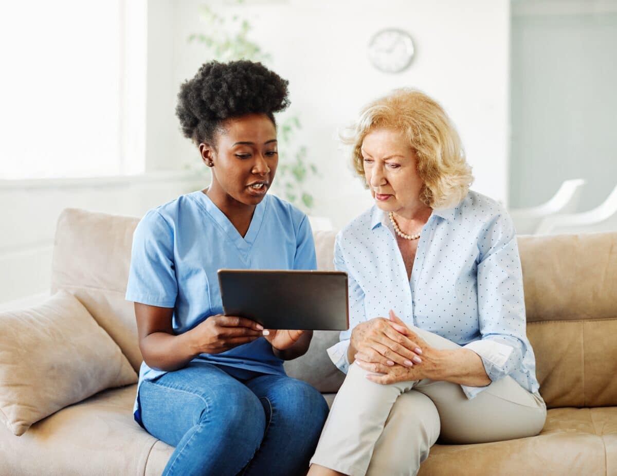 Doctor or nurse with patient