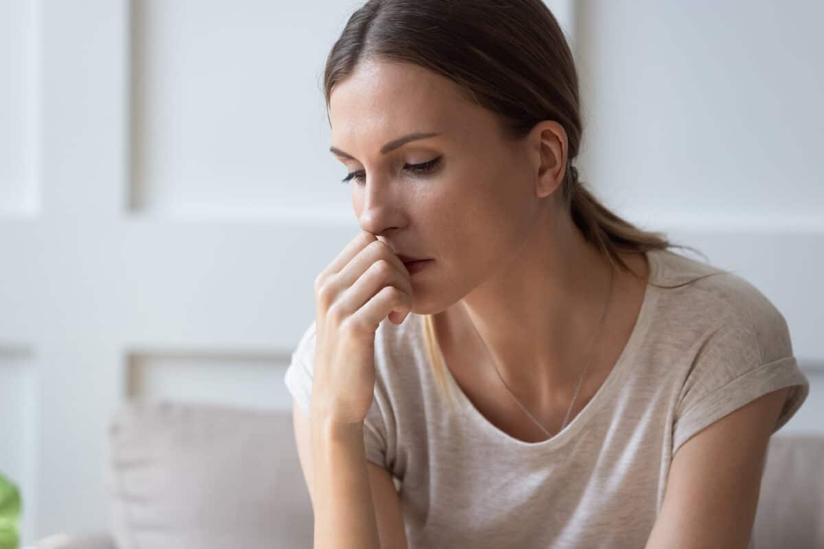 Woman thinking, stressed, or worried
