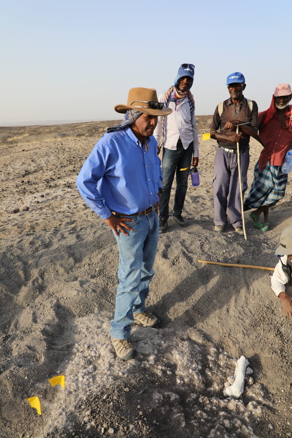 Haile-Selassie and his crew members in the field.