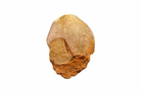 Oldowan stone tool isolated on white background. Simple tools associated with Homohabilis.