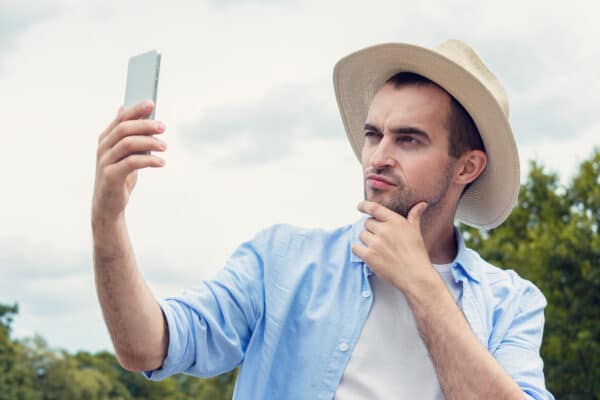 Narcissist snapping a selfie of himself