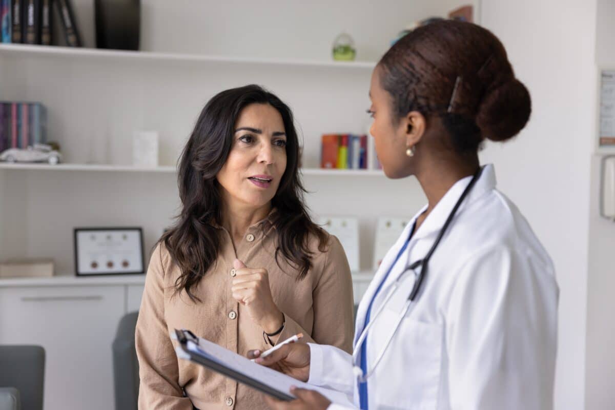 Female patient has a conversation with her doctor