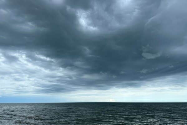 Clouds hovering over the open ocean