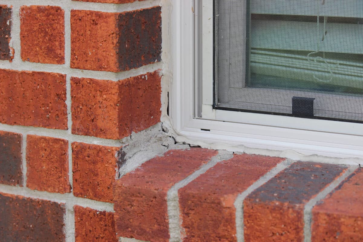 Cracks around windows can allow cold air inside.