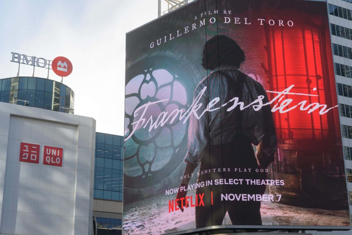 Toronto, Ontario, Canada - November 4, 2025: digital ad for Guillermo del Toro's Frankenstein at Sankofa Square.