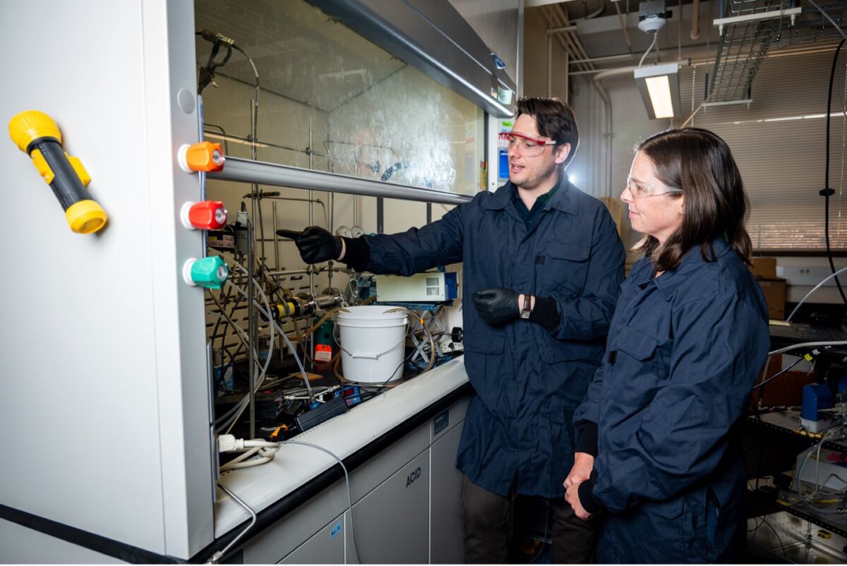 Nate Reed and Ellie Browne working in the lab.