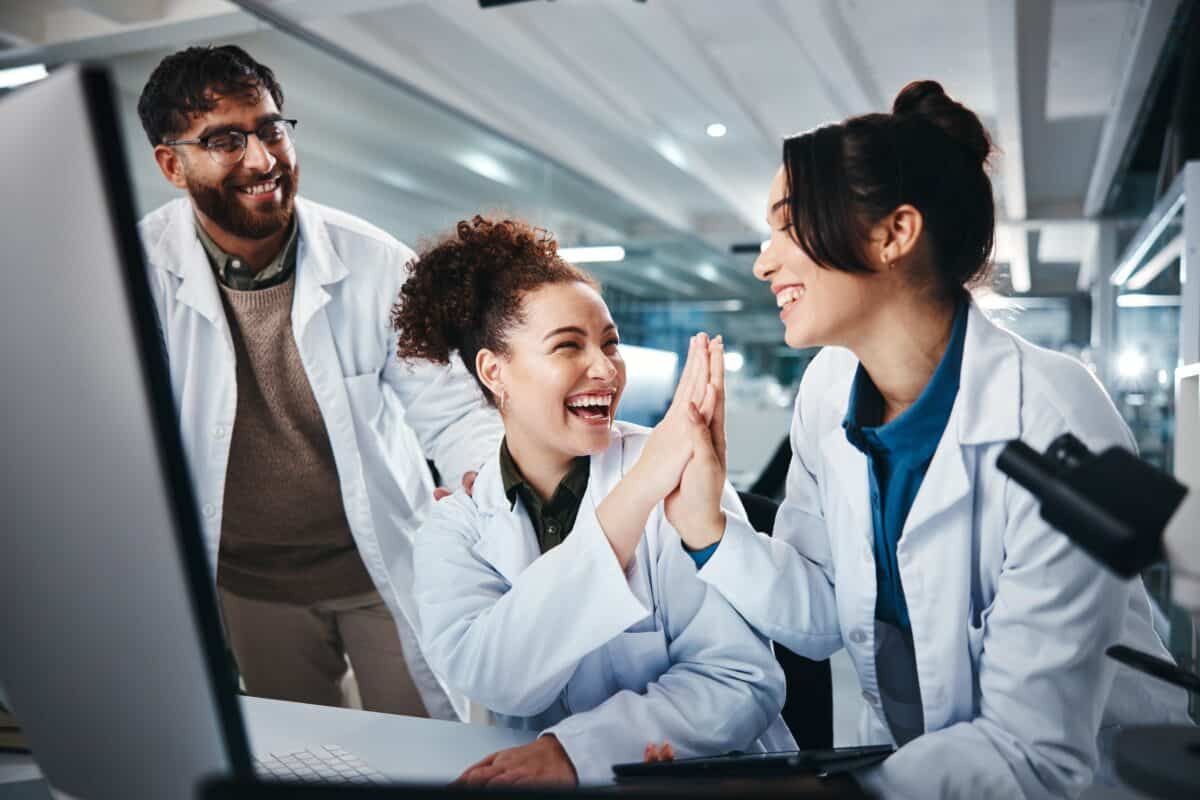 scientists celebrating