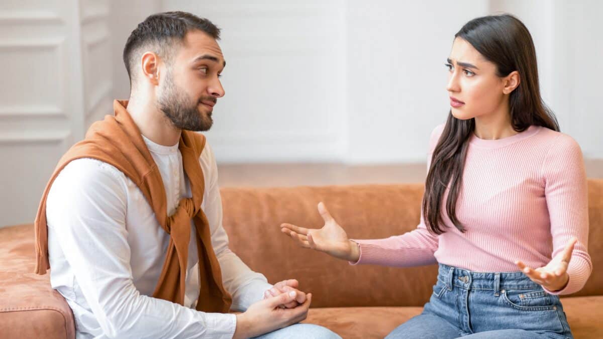 Discontented,Wife,Talking,To,Husband,Having,Quarrel,Sitting,At,Home