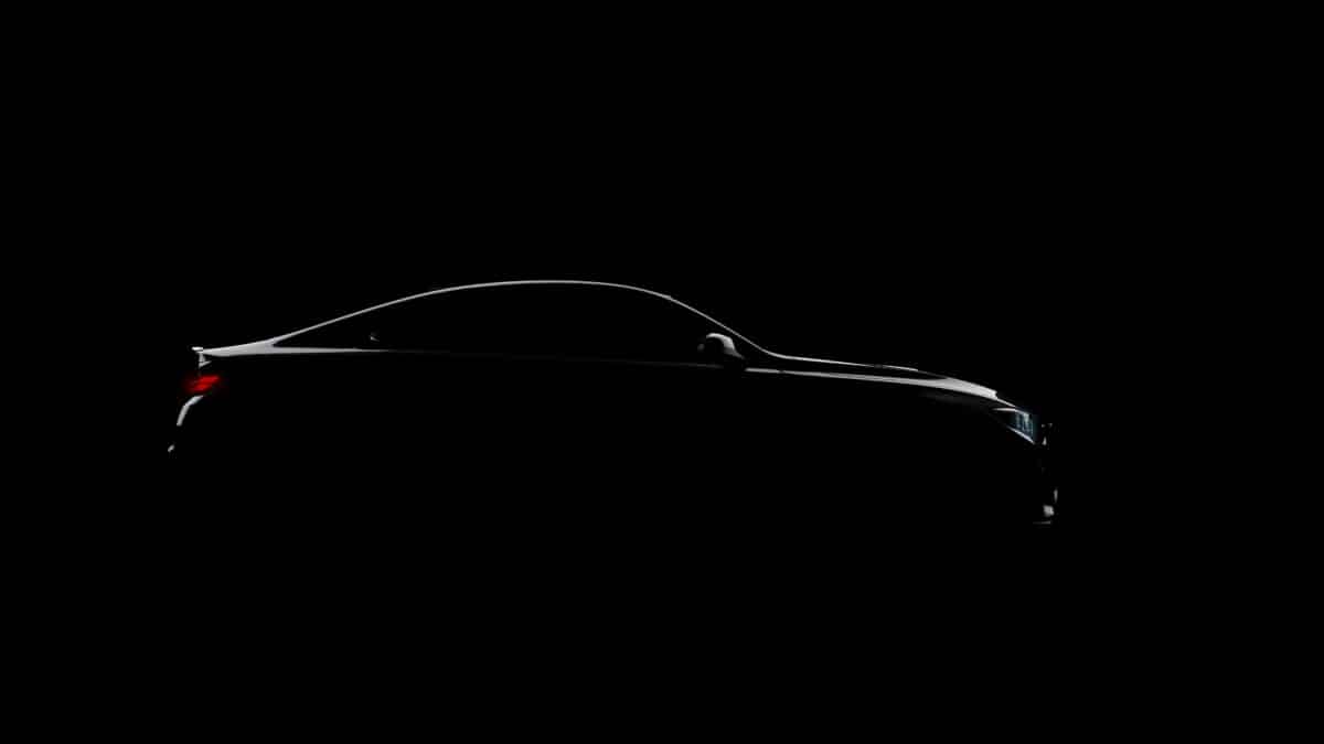 silhouette of black sports car on black