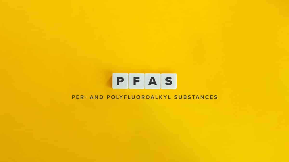 PFAS, Per- and polyfluoroalkyl substances, also known as Forever Substances. Text on Block Letter Tiles and Icon on Flat Background. Minimalist Aesthetics.
