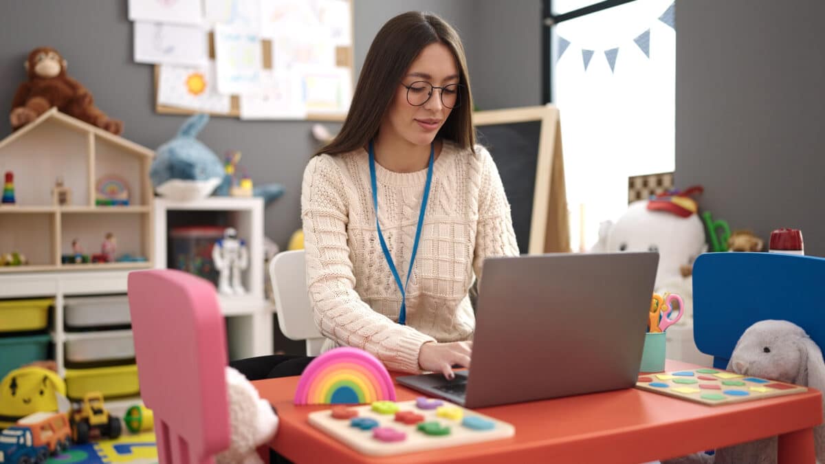 Teacher on laptop computer