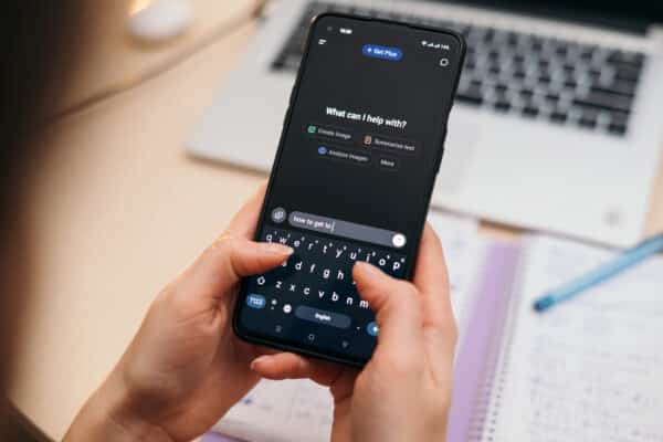 A person uses an AI (artificial intelligence) app on their smartphone