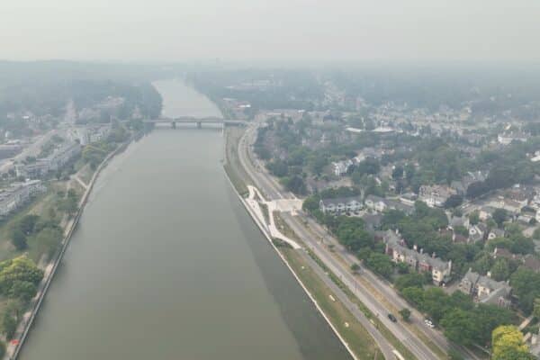 Downtown Rochester, New York in dense smoke from Canadian wildfires blowing over city skyline.