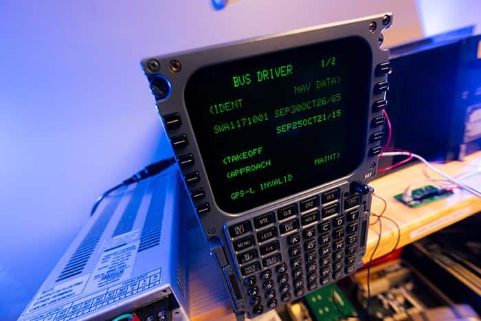 This computer that displays this path information, along with other critical flight data for the pilots in the cockpit. The screen displays "bus driver" to show that the researchers have control of it.