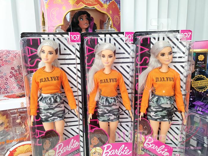 Pic of three packaged Fashionist Barbie Dolls