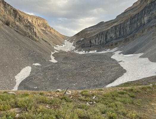 This cirque under Utah's Mount Timpanogos contains a hidden 'rock glacier' holding enough water to fill 600 Olympic swimming pools, according to University of Utah researchers.